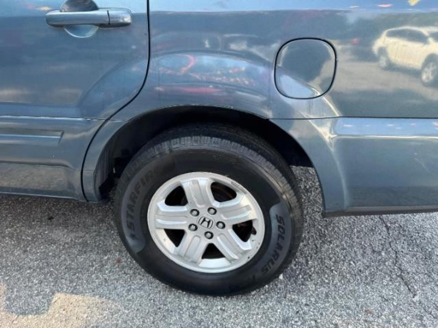 2006 Honda Pilot LX (5FNYF28106B) with an 3.5L V6 SOHC 24V engine, 5-Speed Automatic transmission, located at 1806 Veterans Memorial Hwy SW, Austell, GA, 30168, (770) 944-9558, 33.817959, -84.606987 - Photo#23