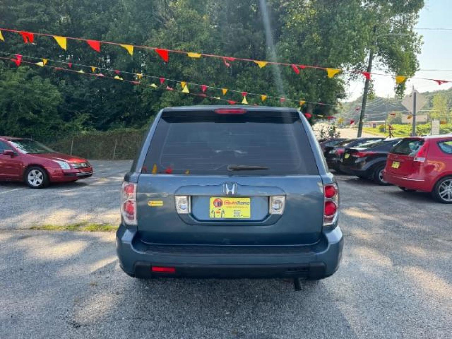 2006 Honda Pilot LX (5FNYF28106B) with an 3.5L V6 SOHC 24V engine, 5-Speed Automatic transmission, located at 1806 Veterans Memorial Hwy SW, Austell, GA, 30168, (770) 944-9558, 33.817959, -84.606987 - Photo#4