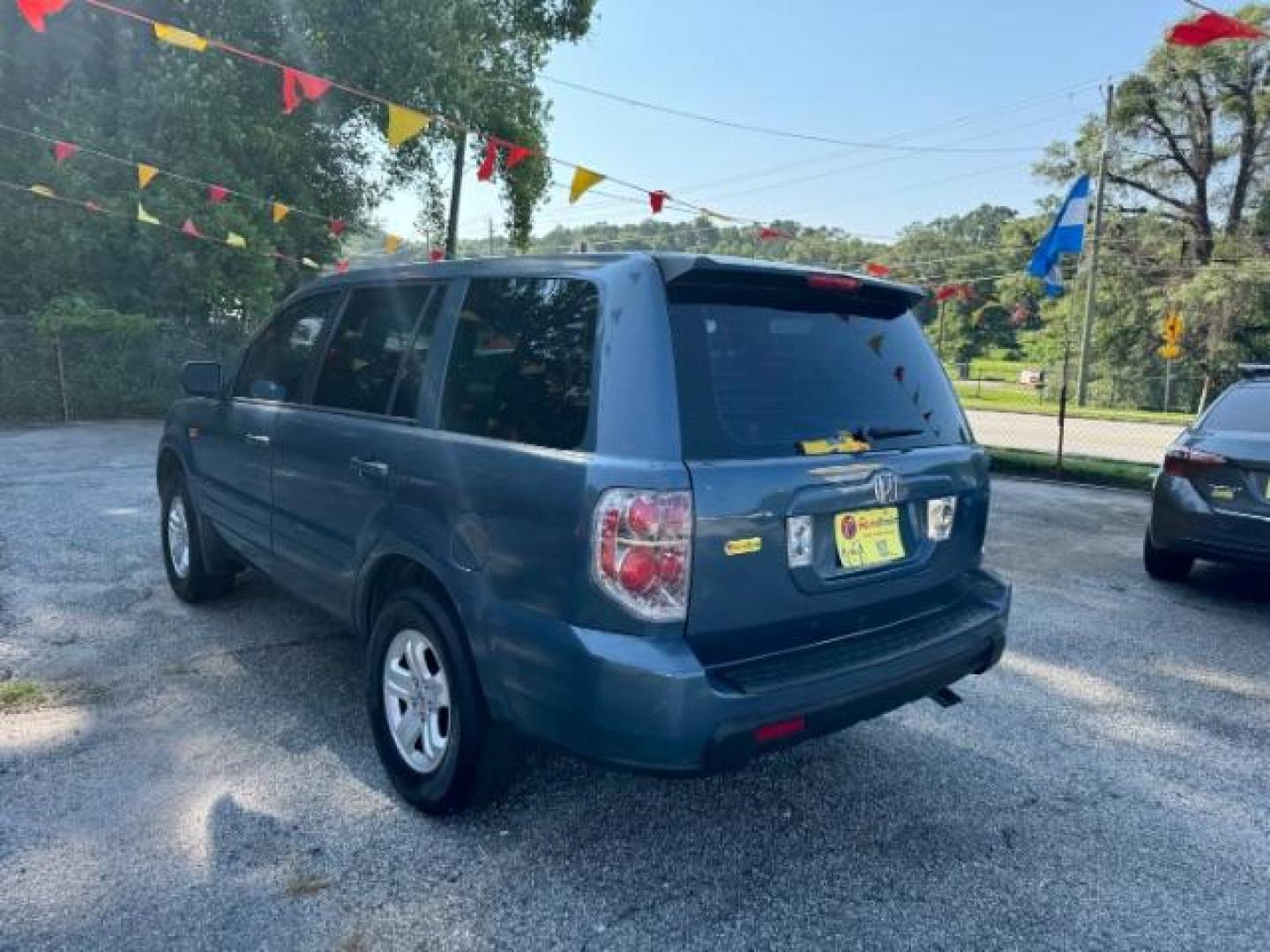 2006 Honda Pilot LX (5FNYF28106B) with an 3.5L V6 SOHC 24V engine, 5-Speed Automatic transmission, located at 1806 Veterans Memorial Hwy SW, Austell, GA, 30168, (770) 944-9558, 33.817959, -84.606987 - Photo#5