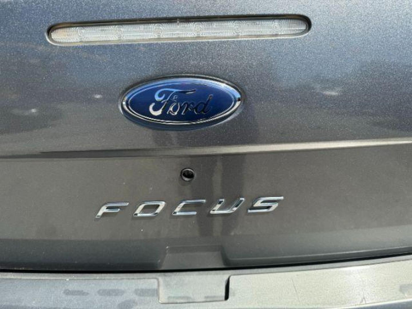 2009 Gray Ford Focus SE Sedan (1FAHP35N19W) with an 2.0L L4 DOHC 16V engine, located at 1806 Veterans Memorial Hwy SW, Austell, GA, 30168, (770) 944-9558, 33.817959, -84.606987 - Photo#13