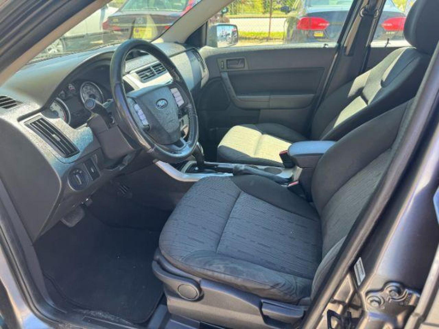 2009 Gray Ford Focus SE Sedan (1FAHP35N19W) with an 2.0L L4 DOHC 16V engine, located at 1806 Veterans Memorial Hwy SW, Austell, GA, 30168, (770) 944-9558, 33.817959, -84.606987 - Photo#6