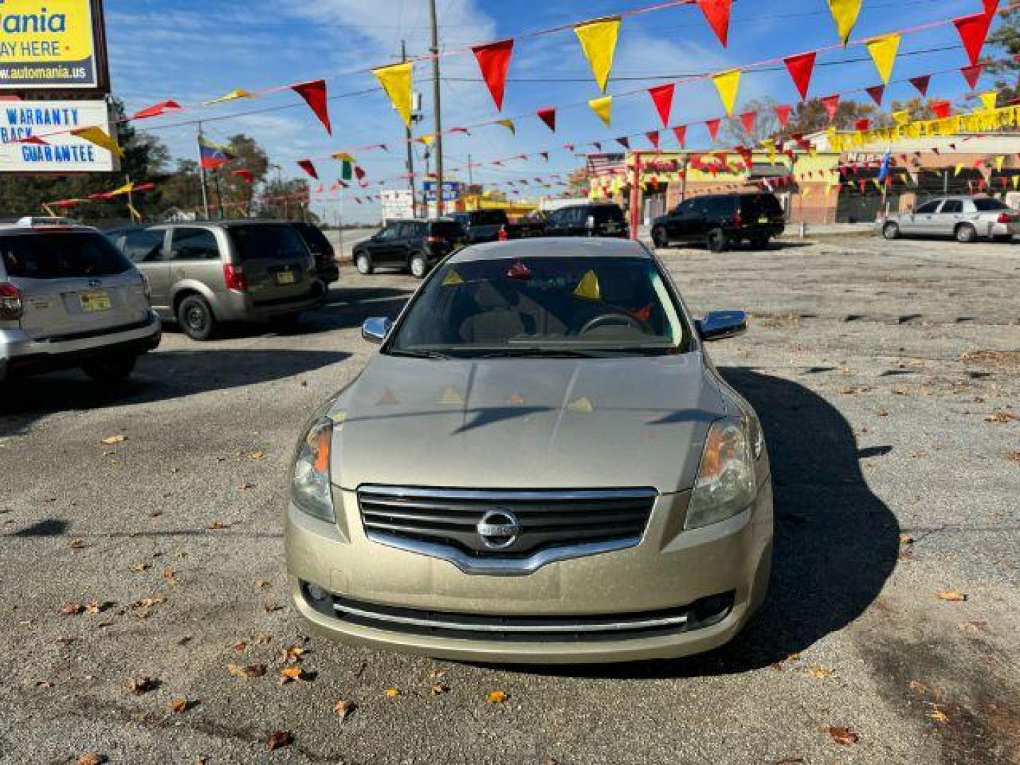 2009 GOLD Nissan Altima 2.5 S (1N4AL21EX9N) with an 2.5L L4 DOHC 16V engine, Continuously Variable Transmission transmission, located at 1806 Veterans Memorial Hwy SW, Austell, GA, 30168, (770) 944-9558, 33.817959, -84.606987 - Photo#0