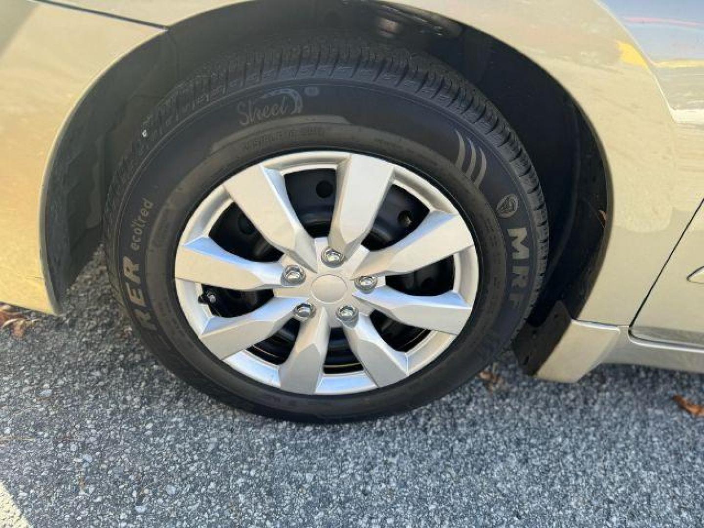 2009 GOLD Nissan Altima 2.5 S (1N4AL21EX9N) with an 2.5L L4 DOHC 16V engine, Continuously Variable Transmission transmission, located at 1806 Veterans Memorial Hwy SW, Austell, GA, 30168, (770) 944-9558, 33.817959, -84.606987 - Photo#17