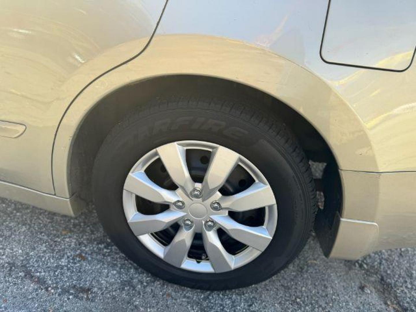 2009 GOLD Nissan Altima 2.5 S (1N4AL21EX9N) with an 2.5L L4 DOHC 16V engine, Continuously Variable Transmission transmission, located at 1806 Veterans Memorial Hwy SW, Austell, GA, 30168, (770) 944-9558, 33.817959, -84.606987 - Photo#18