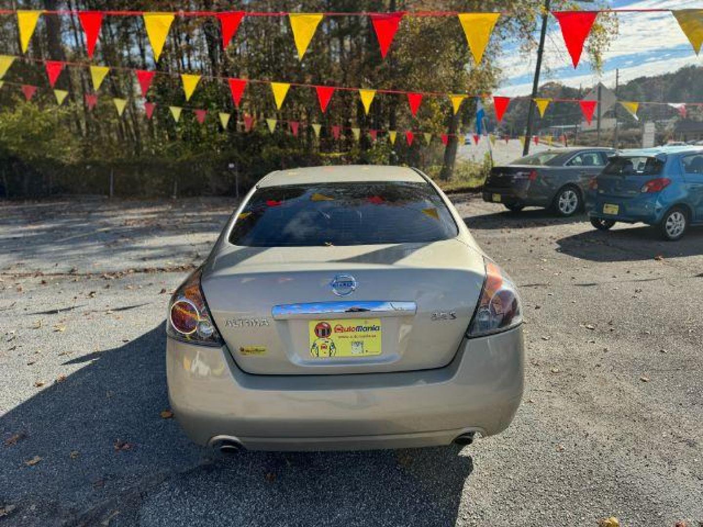 2009 GOLD Nissan Altima 2.5 S (1N4AL21EX9N) with an 2.5L L4 DOHC 16V engine, Continuously Variable Transmission transmission, located at 1806 Veterans Memorial Hwy SW, Austell, GA, 30168, (770) 944-9558, 33.817959, -84.606987 - Photo#4