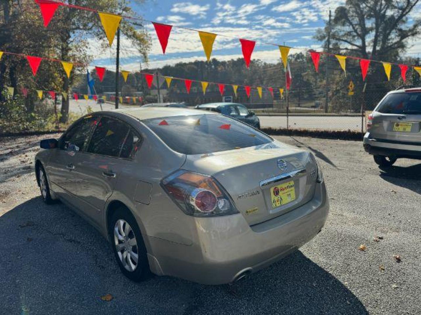 2009 GOLD Nissan Altima 2.5 S (1N4AL21EX9N) with an 2.5L L4 DOHC 16V engine, Continuously Variable Transmission transmission, located at 1806 Veterans Memorial Hwy SW, Austell, GA, 30168, (770) 944-9558, 33.817959, -84.606987 - Photo#5