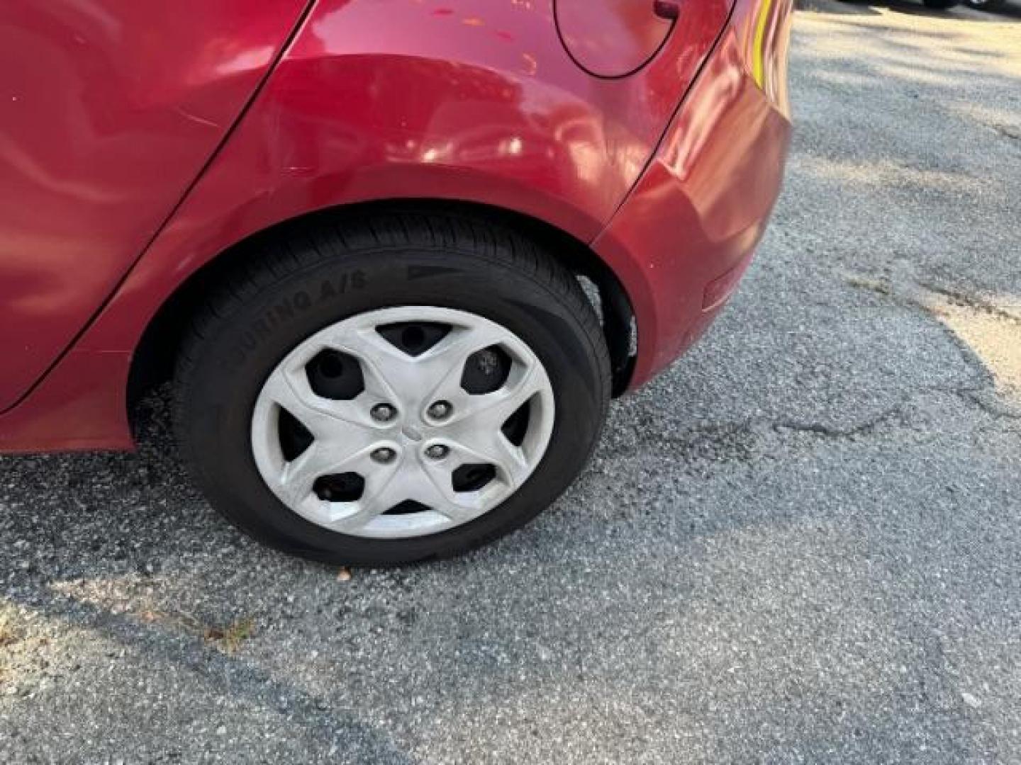 2011 RED Ford Fiesta SE Hatchback (3FADP4EJ6BM) with an 1.6L L4 DOHC 16V engine, 6-Speed Automatic transmission, located at 1806 Veterans Memorial Hwy SW, Austell, GA, 30168, (770) 944-9558, 33.817959, -84.606987 - Photo#21