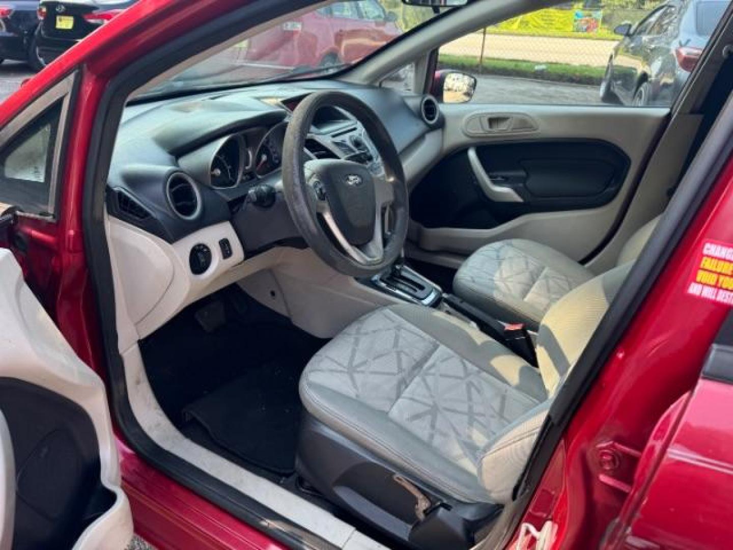 2011 RED Ford Fiesta SE Hatchback (3FADP4EJ6BM) with an 1.6L L4 DOHC 16V engine, 6-Speed Automatic transmission, located at 1806 Veterans Memorial Hwy SW, Austell, GA, 30168, (770) 944-9558, 33.817959, -84.606987 - Photo#6