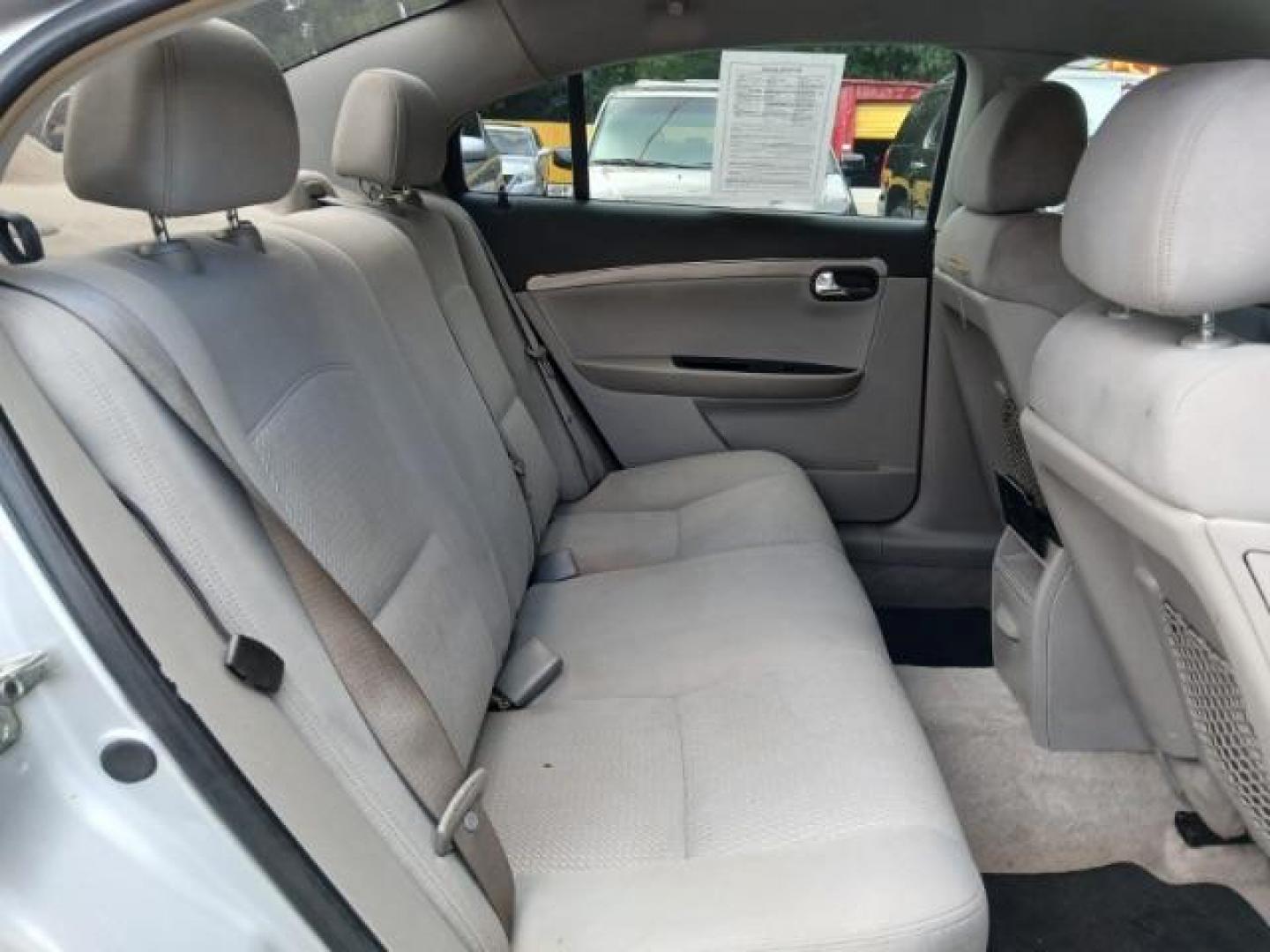 2009 Silver Saturn Aura XE (1G8ZS57B29F) with an 2.4L L4 DOHC 16V engine, 4-Speed Automatic transmission, located at 1806 Veterans Memorial Hwy SW, Austell, GA, 30168, (770) 944-9558, 33.817959, -84.606987 - Photo#9