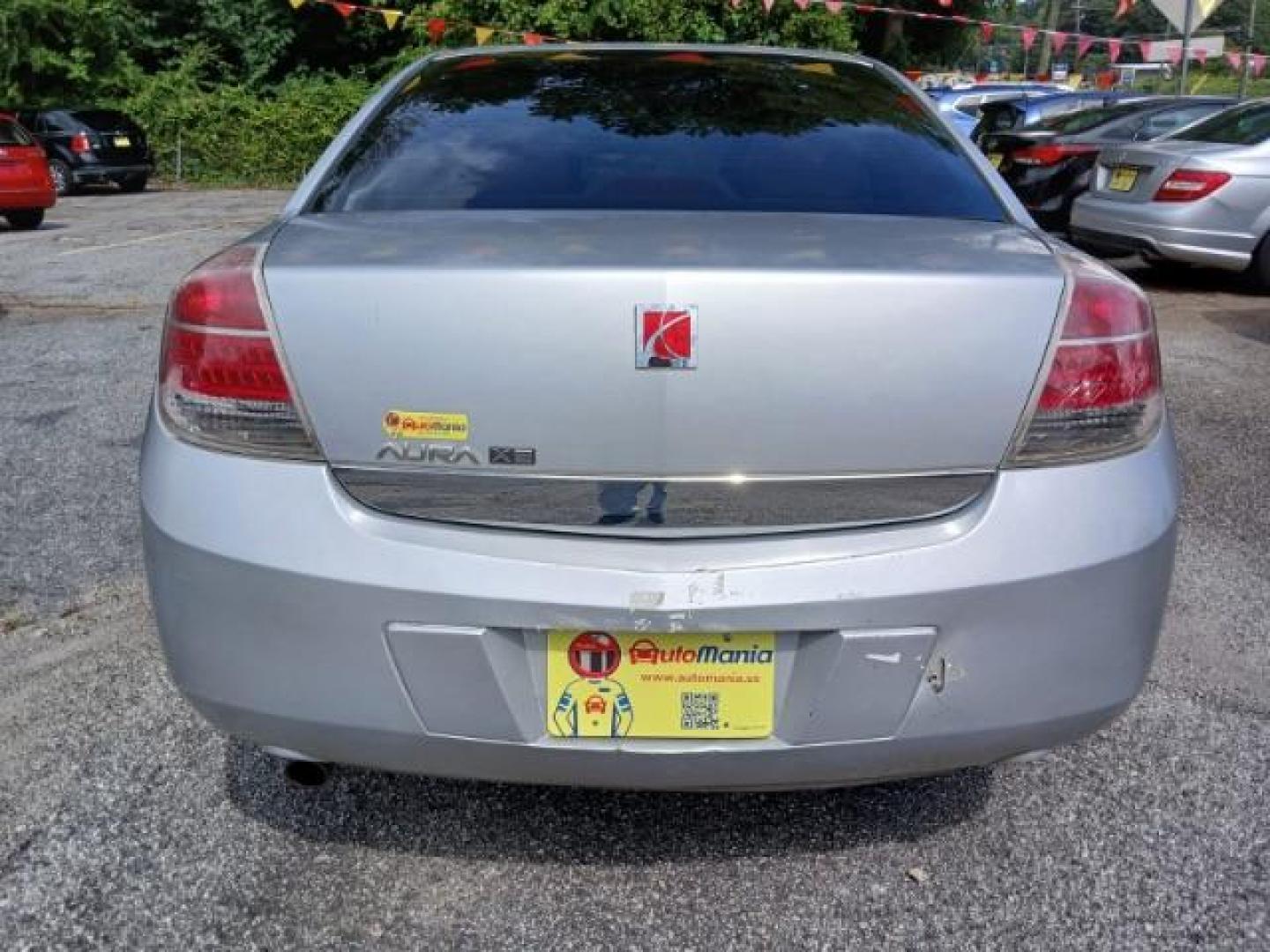 2009 Silver Saturn Aura XE (1G8ZS57B29F) with an 2.4L L4 DOHC 16V engine, 4-Speed Automatic transmission, located at 1806 Veterans Memorial Hwy SW, Austell, GA, 30168, (770) 944-9558, 33.817959, -84.606987 - Photo#4