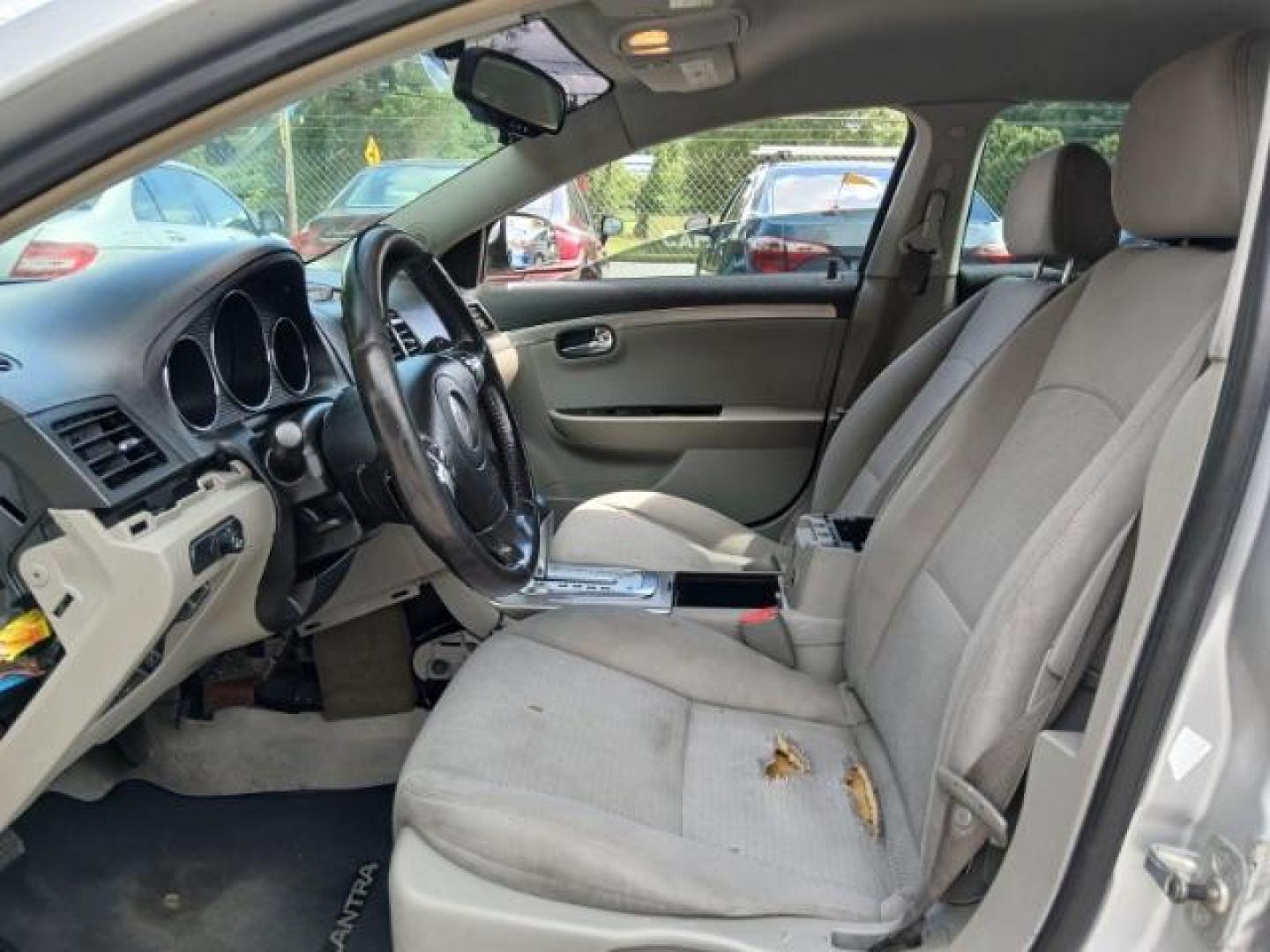 2009 Silver Saturn Aura XE (1G8ZS57B29F) with an 2.4L L4 DOHC 16V engine, 4-Speed Automatic transmission, located at 1806 Veterans Memorial Hwy SW, Austell, GA, 30168, (770) 944-9558, 33.817959, -84.606987 - Photo#7