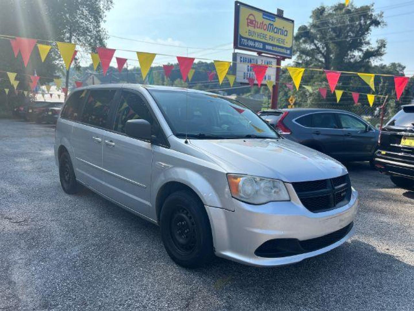 2011 Silver Dodge Grand Caravan Express (2D4RN4DG8BR) with an 3.6L V6 DOHC 24V engine, located at 1806 Veterans Memorial Hwy SW, Austell, GA, 30168, (770) 944-9558, 33.817959, -84.606987 - Photo#2