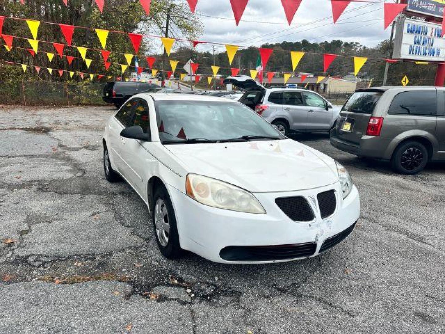 2006 White Pontiac G6 Sedan (1G2ZF55B464) with an 2.4L L4 OHV 8V engine, 4-Speed Automatic transmission, located at 1806 Veterans Memorial Hwy SW, Austell, GA, 30168, (770) 944-9558, 33.817959, -84.606987 - Photo#0