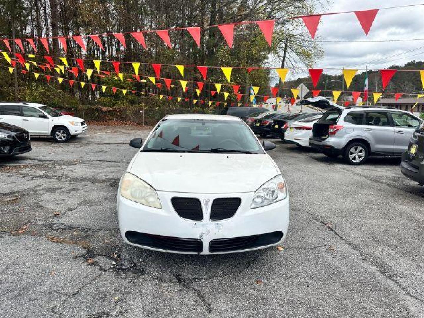 2006 White Pontiac G6 Sedan (1G2ZF55B464) with an 2.4L L4 OHV 8V engine, 4-Speed Automatic transmission, located at 1806 Veterans Memorial Hwy SW, Austell, GA, 30168, (770) 944-9558, 33.817959, -84.606987 - Photo#1