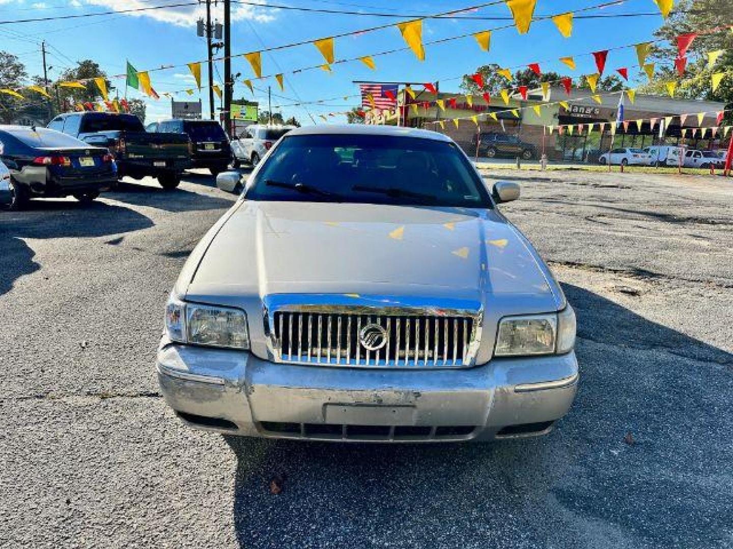 2006 Silver Mercury Grand Marquis LS Premium (2MEFM75V66X) with an 4.6L V8 OHC 16V FFV engine, 4-Speed Automatic transmission, located at 1806 Veterans Memorial Hwy SW, Austell, GA, 30168, (770) 944-9558, 33.817959, -84.606987 - Photo#1