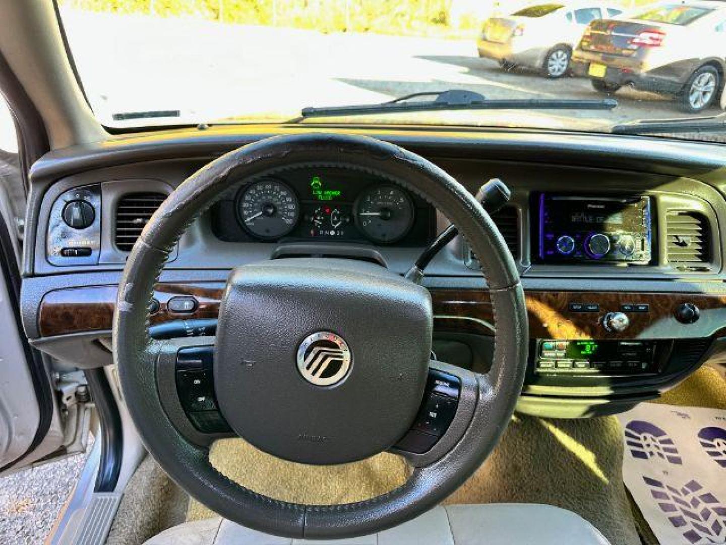 2006 Silver Mercury Grand Marquis LS Premium (2MEFM75V66X) with an 4.6L V8 OHC 16V FFV engine, 4-Speed Automatic transmission, located at 1806 Veterans Memorial Hwy SW, Austell, GA, 30168, (770) 944-9558, 33.817959, -84.606987 - Photo#7