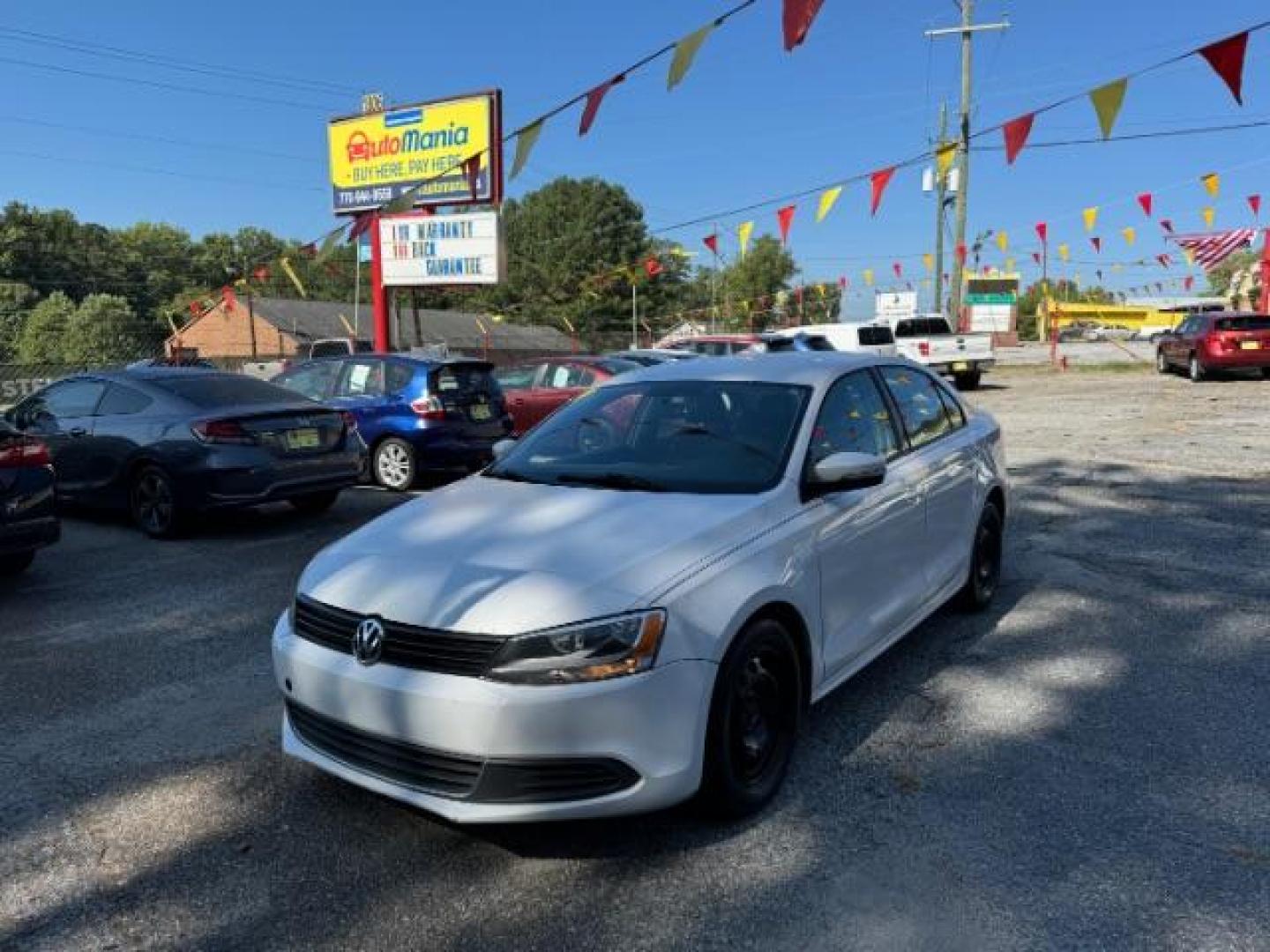 2012 WHITE Volkswagen Jetta SE (3VWDX7AJ9CM) with an 2.5L L5 DOHC 20V engine, 6-Speed Automatic transmission, located at 1806 Veterans Memorial Hwy SW, Austell, GA, 30168, (770) 944-9558, 33.817959, -84.606987 - Photo#0