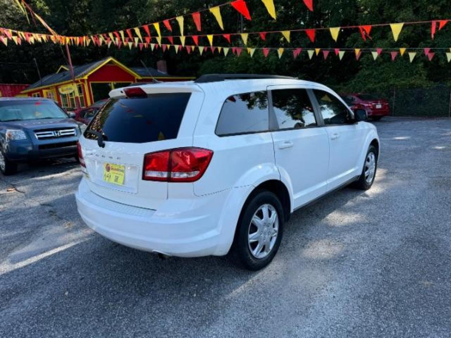 2014 WHITE Dodge Journey SE (3C4PDCAB5ET) with an 2.4L L4 DOHC 16V engine, 4-Speed Automatic transmission, located at 1806 Veterans Memorial Hwy SW, Austell, GA, 30168, (770) 944-9558, 33.817959, -84.606987 - Photo#3