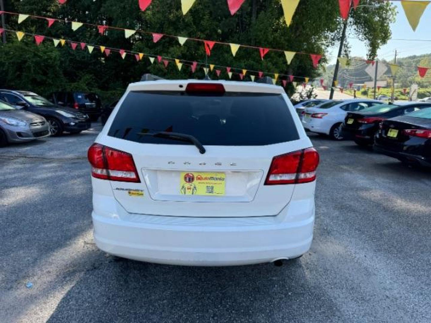 2014 WHITE Dodge Journey SE (3C4PDCAB5ET) with an 2.4L L4 DOHC 16V engine, 4-Speed Automatic transmission, located at 1806 Veterans Memorial Hwy SW, Austell, GA, 30168, (770) 944-9558, 33.817959, -84.606987 - Photo#4