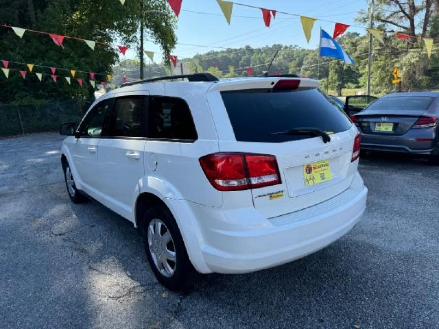 2014 WHITE Dodge Journey SE (3C4PDCAB5ET) with an 2.4L L4 DOHC 16V engine, 4-Speed Automatic transmission, located at 1806 Veterans Memorial Hwy SW, Austell, GA, 30168, (770) 944-9558, 33.817959, -84.606987 - Photo#5