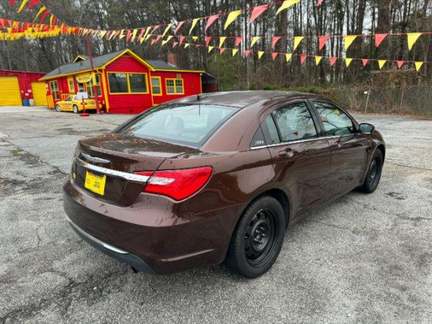 2012 Maroon Chrysler 200 LX (1C3CCBAB6CN) with an 2.4L L4 DOHC 16V engine, 6-Speed Automatic transmission, located at 1806 Veterans Memorial Hwy SW, Austell, GA, 30168, (770) 944-9558, 33.817959, -84.606987 - Photo#3