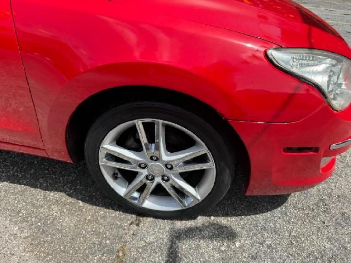 2009 Red Hyundai Elantra Automatic (KMHDC86E09U) with an 2.0L L4 DOHC 16V engine, 4-Speed Automatic transmission, located at 1806 Veterans Memorial Hwy SW, Austell, GA, 30168, (770) 944-9558, 33.817959, -84.606987 - Photo#20