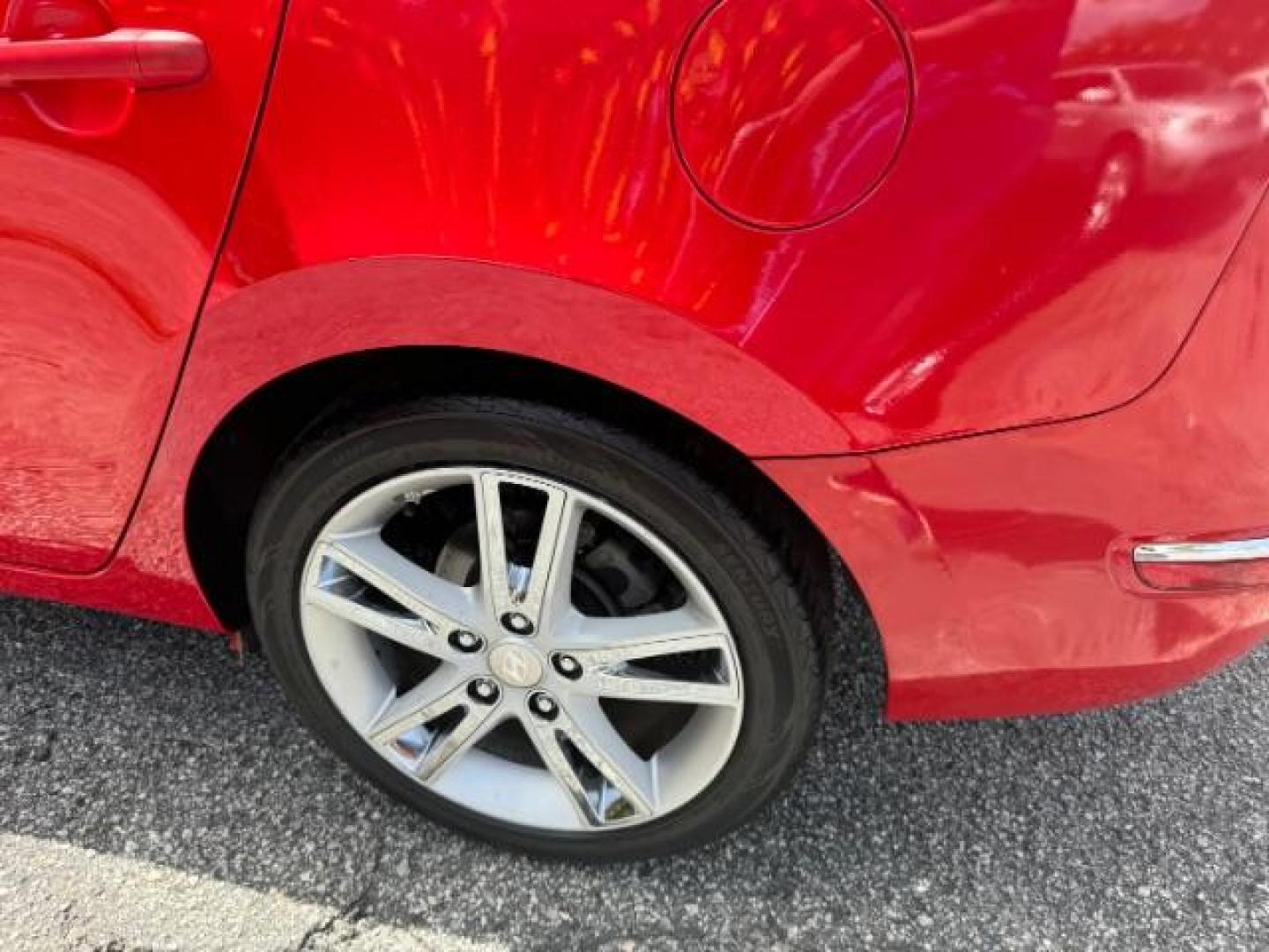 2009 Red Hyundai Elantra Automatic (KMHDC86E09U) with an 2.0L L4 DOHC 16V engine, 4-Speed Automatic transmission, located at 1806 Veterans Memorial Hwy SW, Austell, GA, 30168, (770) 944-9558, 33.817959, -84.606987 - Photo#22