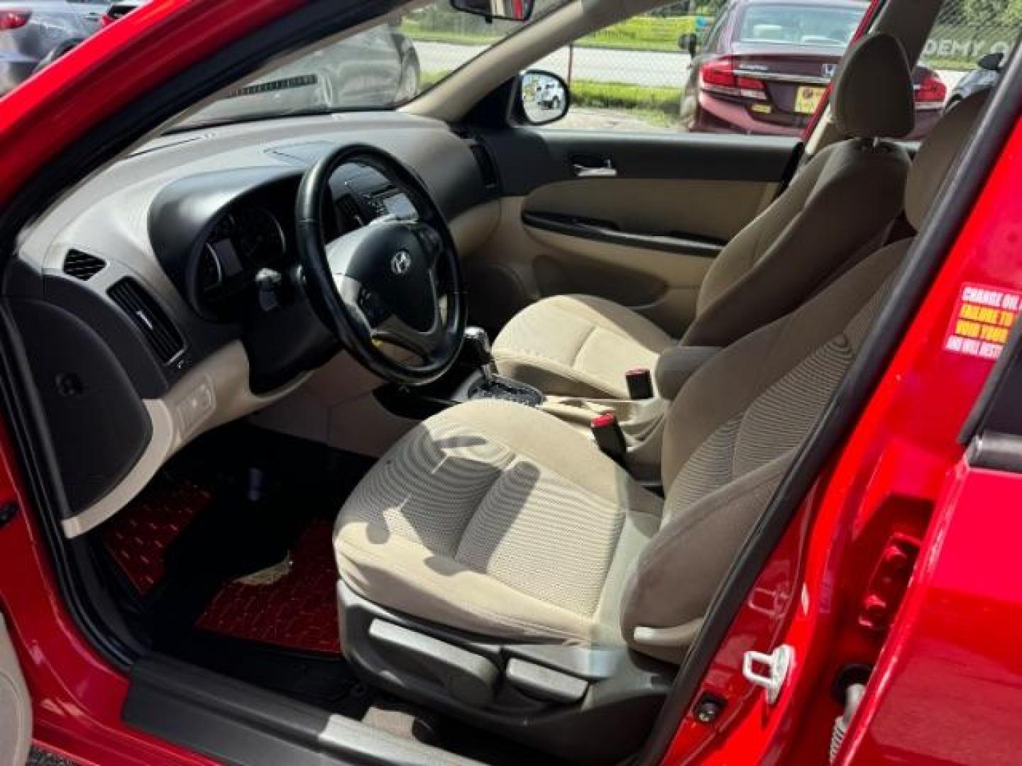 2009 Red Hyundai Elantra Automatic (KMHDC86E09U) with an 2.0L L4 DOHC 16V engine, 4-Speed Automatic transmission, located at 1806 Veterans Memorial Hwy SW, Austell, GA, 30168, (770) 944-9558, 33.817959, -84.606987 - Photo#6