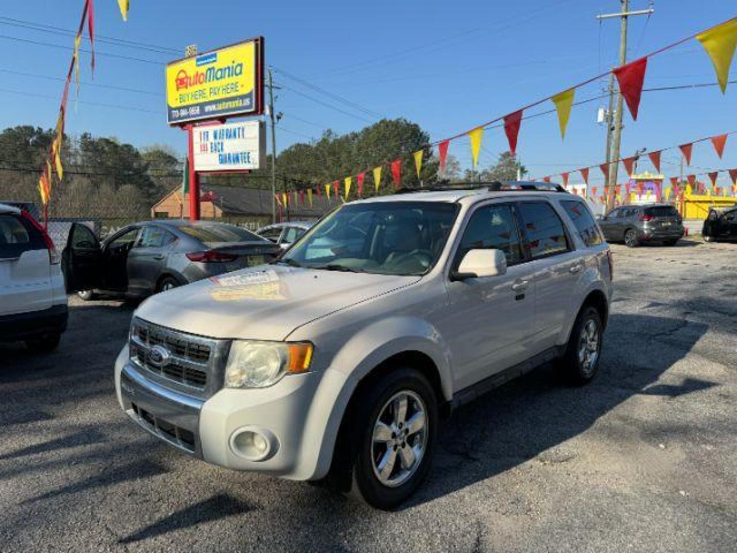 2012 White Ford Escape Limited FWD (1FMCU0E73CK) with an 2.5L L4 DOHC 16V engine, 6-Speed Automatic transmission, located at 1806 Veterans Memorial Hwy SW, Austell, GA, 30168, (770) 944-9558, 33.817959, -84.606987 - Photo#0