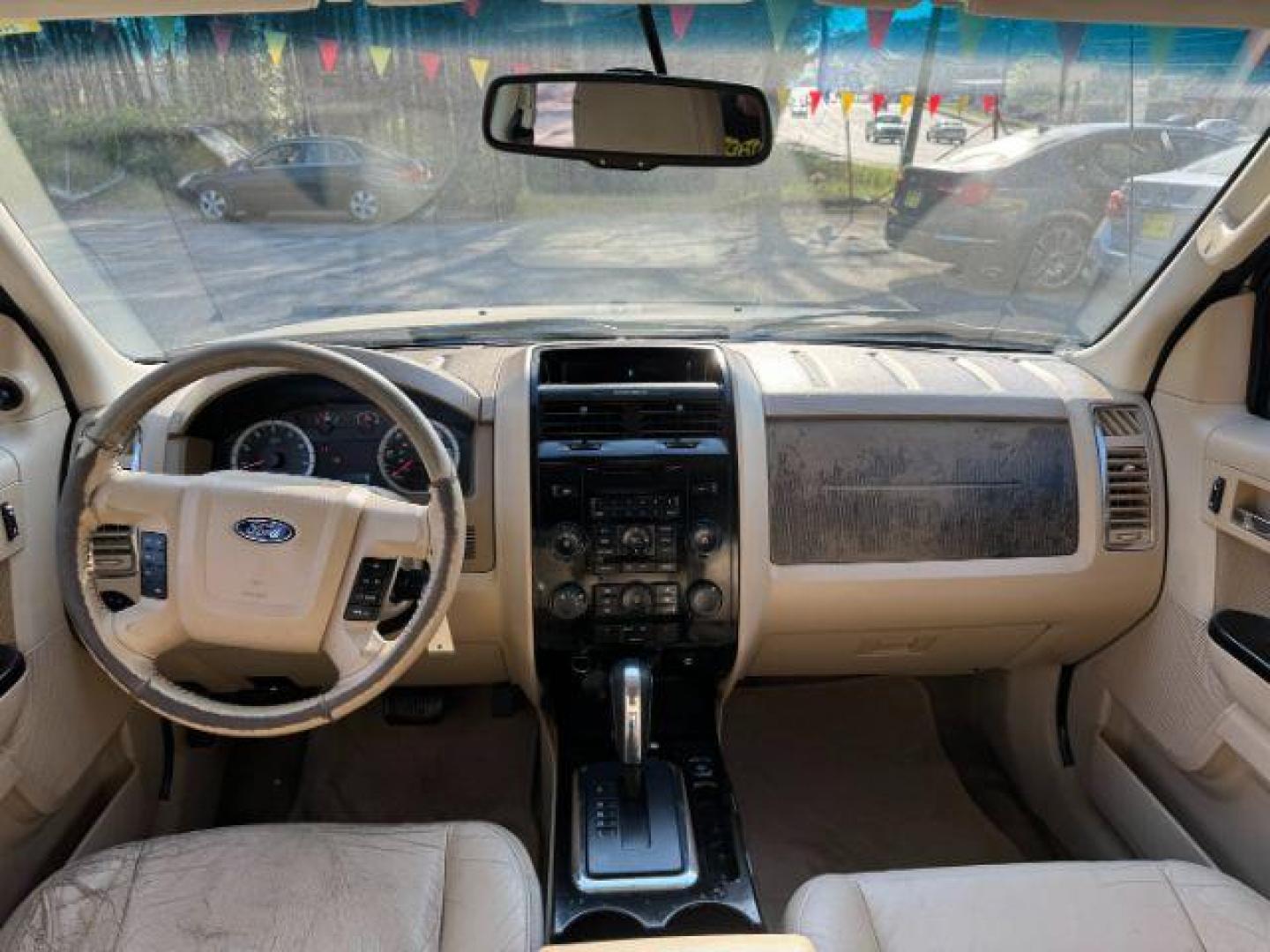 2012 White Ford Escape Limited FWD (1FMCU0E73CK) with an 2.5L L4 DOHC 16V engine, 6-Speed Automatic transmission, located at 1806 Veterans Memorial Hwy SW, Austell, GA, 30168, (770) 944-9558, 33.817959, -84.606987 - Photo#11