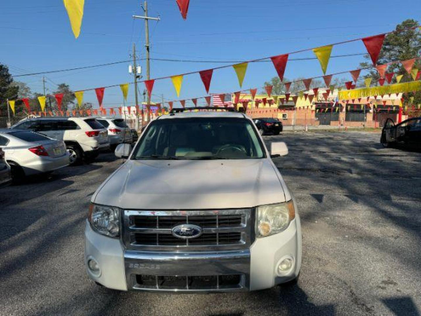 2012 White Ford Escape Limited FWD (1FMCU0E73CK) with an 2.5L L4 DOHC 16V engine, 6-Speed Automatic transmission, located at 1806 Veterans Memorial Hwy SW, Austell, GA, 30168, (770) 944-9558, 33.817959, -84.606987 - Photo#1