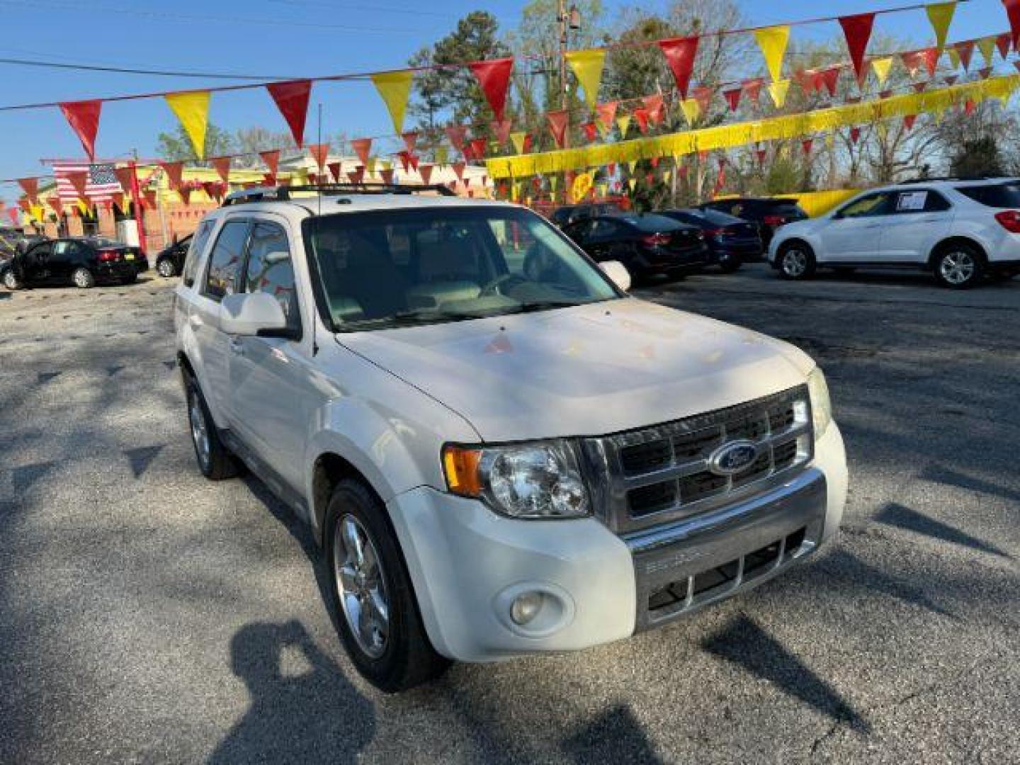 2012 White Ford Escape Limited FWD (1FMCU0E73CK) with an 2.5L L4 DOHC 16V engine, 6-Speed Automatic transmission, located at 1806 Veterans Memorial Hwy SW, Austell, GA, 30168, (770) 944-9558, 33.817959, -84.606987 - Photo#2