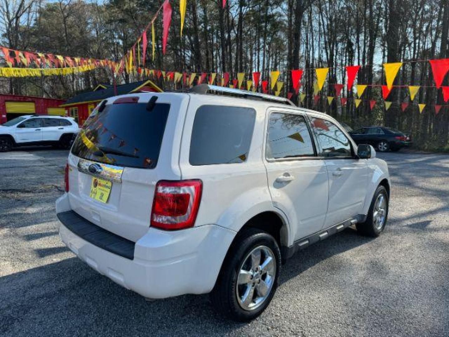 2012 White Ford Escape Limited FWD (1FMCU0E73CK) with an 2.5L L4 DOHC 16V engine, 6-Speed Automatic transmission, located at 1806 Veterans Memorial Hwy SW, Austell, GA, 30168, (770) 944-9558, 33.817959, -84.606987 - Photo#3