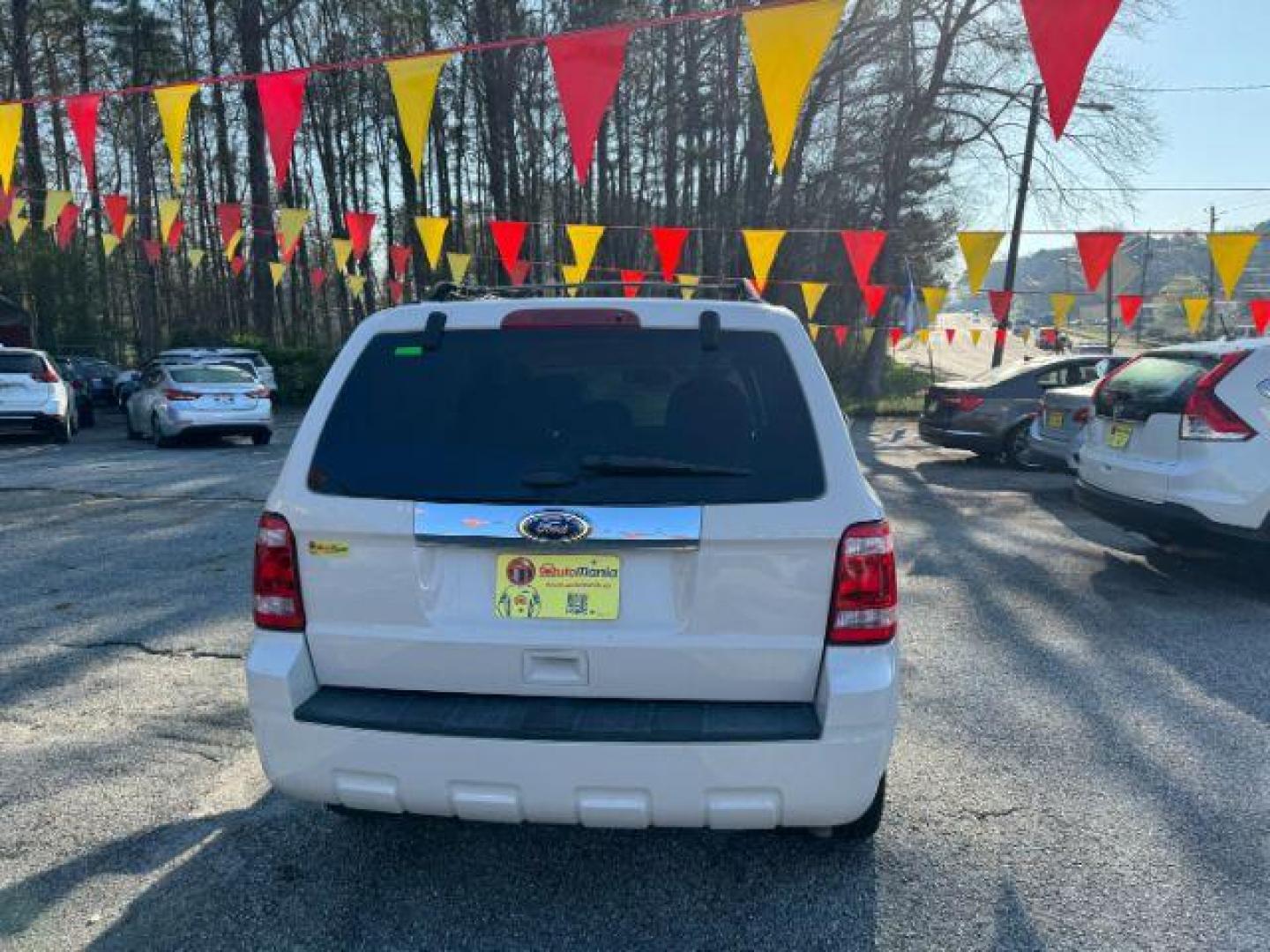 2012 White Ford Escape Limited FWD (1FMCU0E73CK) with an 2.5L L4 DOHC 16V engine, 6-Speed Automatic transmission, located at 1806 Veterans Memorial Hwy SW, Austell, GA, 30168, (770) 944-9558, 33.817959, -84.606987 - Photo#4