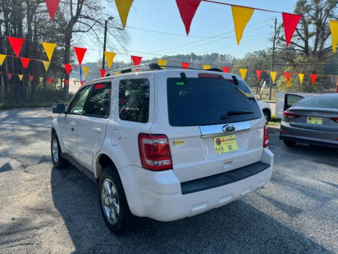 2012 White Ford Escape Limited FWD (1FMCU0E73CK) with an 2.5L L4 DOHC 16V engine, 6-Speed Automatic transmission, located at 1806 Veterans Memorial Hwy SW, Austell, GA, 30168, (770) 944-9558, 33.817959, -84.606987 - Photo#5