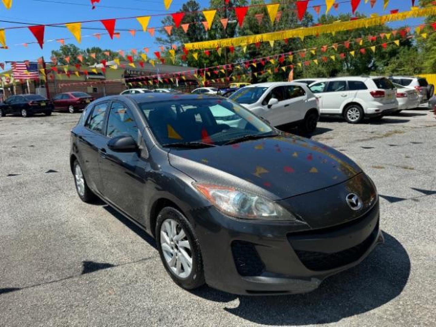 2012 GRAY Mazda MAZDA3 I Touring 5-Door (JM1BL1L83C1) with an 2.0L L4 DOHC 16V engine, 5-Speed Automatic transmission, located at 1806 Veterans Memorial Hwy SW, Austell, GA, 30168, (770) 944-9558, 33.817959, -84.606987 - Photo#2