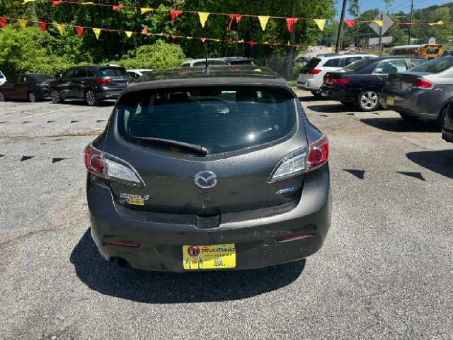 2012 GRAY Mazda MAZDA3 I Touring 5-Door (JM1BL1L83C1) with an 2.0L L4 DOHC 16V engine, 5-Speed Automatic transmission, located at 1806 Veterans Memorial Hwy SW, Austell, GA, 30168, (770) 944-9558, 33.817959, -84.606987 - Photo#4