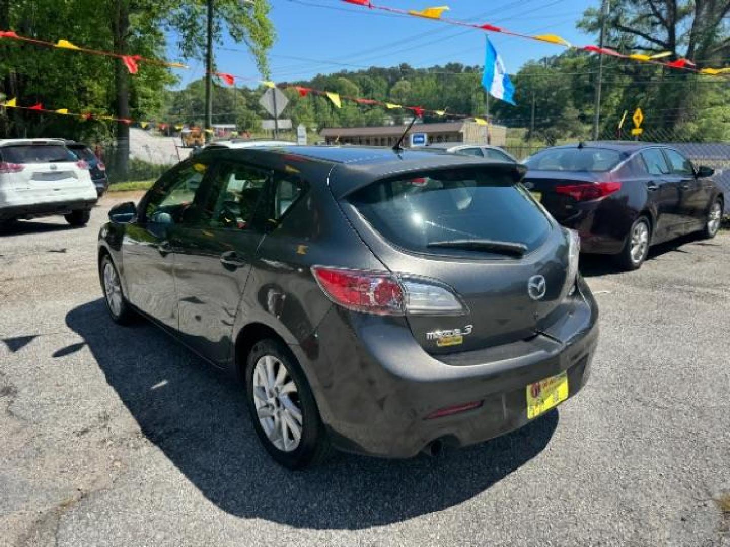 2012 GRAY Mazda MAZDA3 I Touring 5-Door (JM1BL1L83C1) with an 2.0L L4 DOHC 16V engine, 5-Speed Automatic transmission, located at 1806 Veterans Memorial Hwy SW, Austell, GA, 30168, (770) 944-9558, 33.817959, -84.606987 - Photo#5
