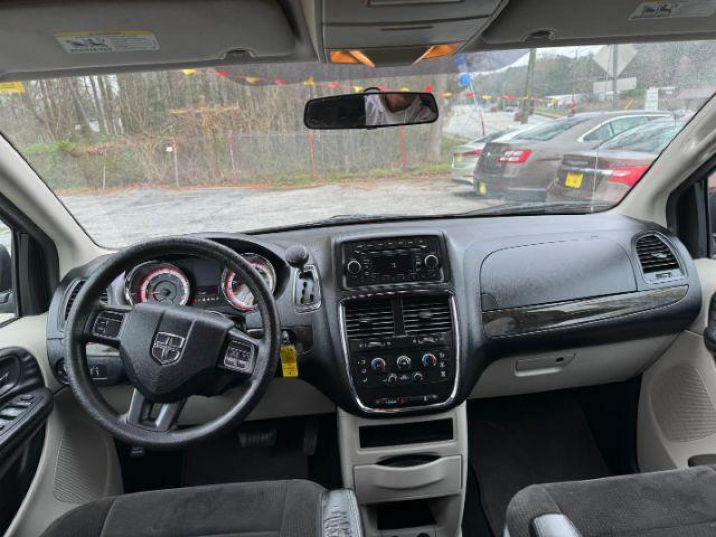 2013 Black Dodge Grand Caravan SE (2C4RDGBG3DR) with an 3.6L V6 DOHC 24V engine, 6-Speed Automatic transmission, located at 1806 Veterans Memorial Hwy SW, Austell, GA, 30168, (770) 944-9558, 33.817959, -84.606987 - Photo#11