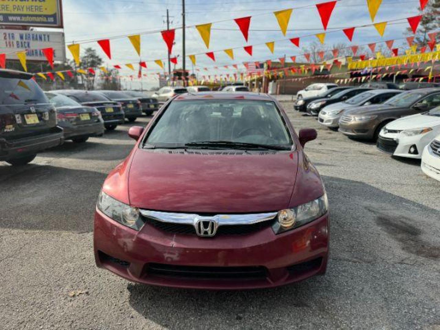 2010 Maroon Honda Civic EX-L Sedan 5-Speed A (19XFA1F92AE) with an 1.8L L4 SOHC 16V engine, 5-Speed Automatic transmission, located at 1806 Veterans Memorial Hwy SW, Austell, GA, 30168, (770) 944-9558, 33.817959, -84.606987 - Photo#1