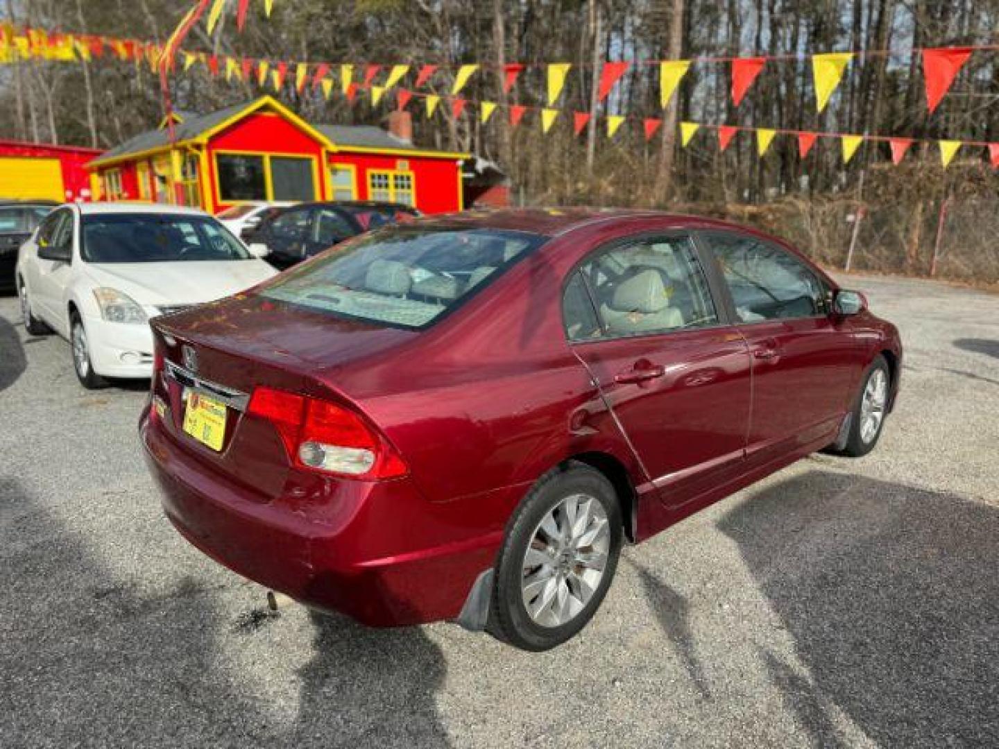 2010 Maroon Honda Civic EX-L Sedan 5-Speed A (19XFA1F92AE) with an 1.8L L4 SOHC 16V engine, 5-Speed Automatic transmission, located at 1806 Veterans Memorial Hwy SW, Austell, GA, 30168, (770) 944-9558, 33.817959, -84.606987 - Photo#3