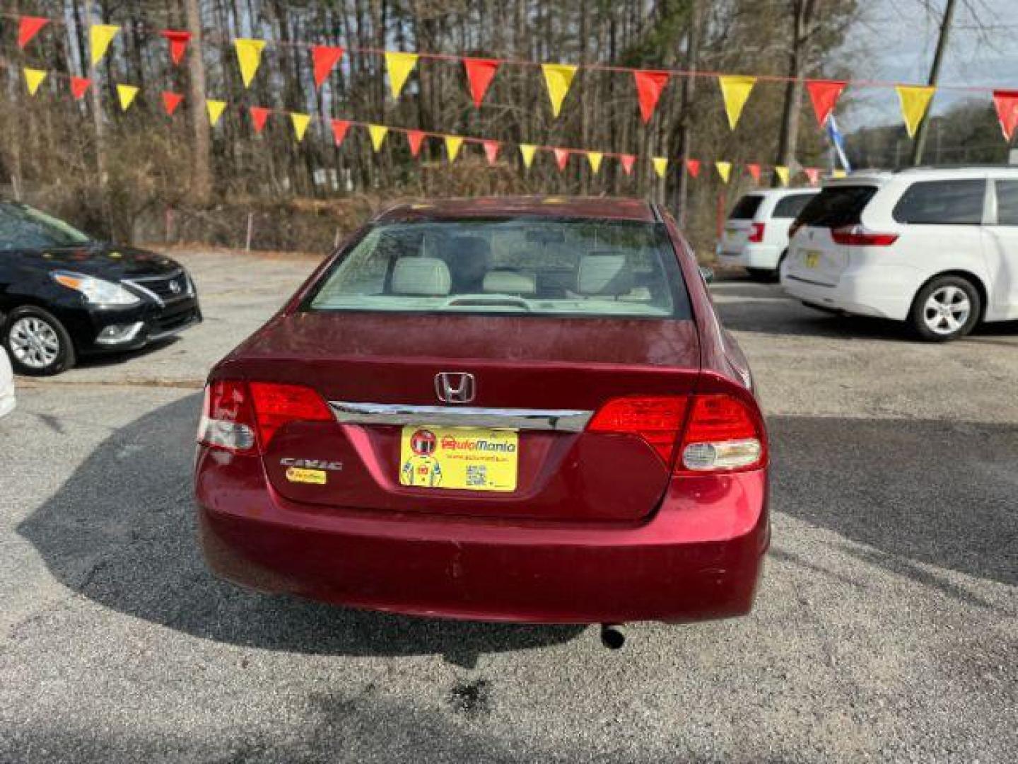 2010 Maroon Honda Civic EX-L Sedan 5-Speed A (19XFA1F92AE) with an 1.8L L4 SOHC 16V engine, 5-Speed Automatic transmission, located at 1806 Veterans Memorial Hwy SW, Austell, GA, 30168, (770) 944-9558, 33.817959, -84.606987 - Photo#4