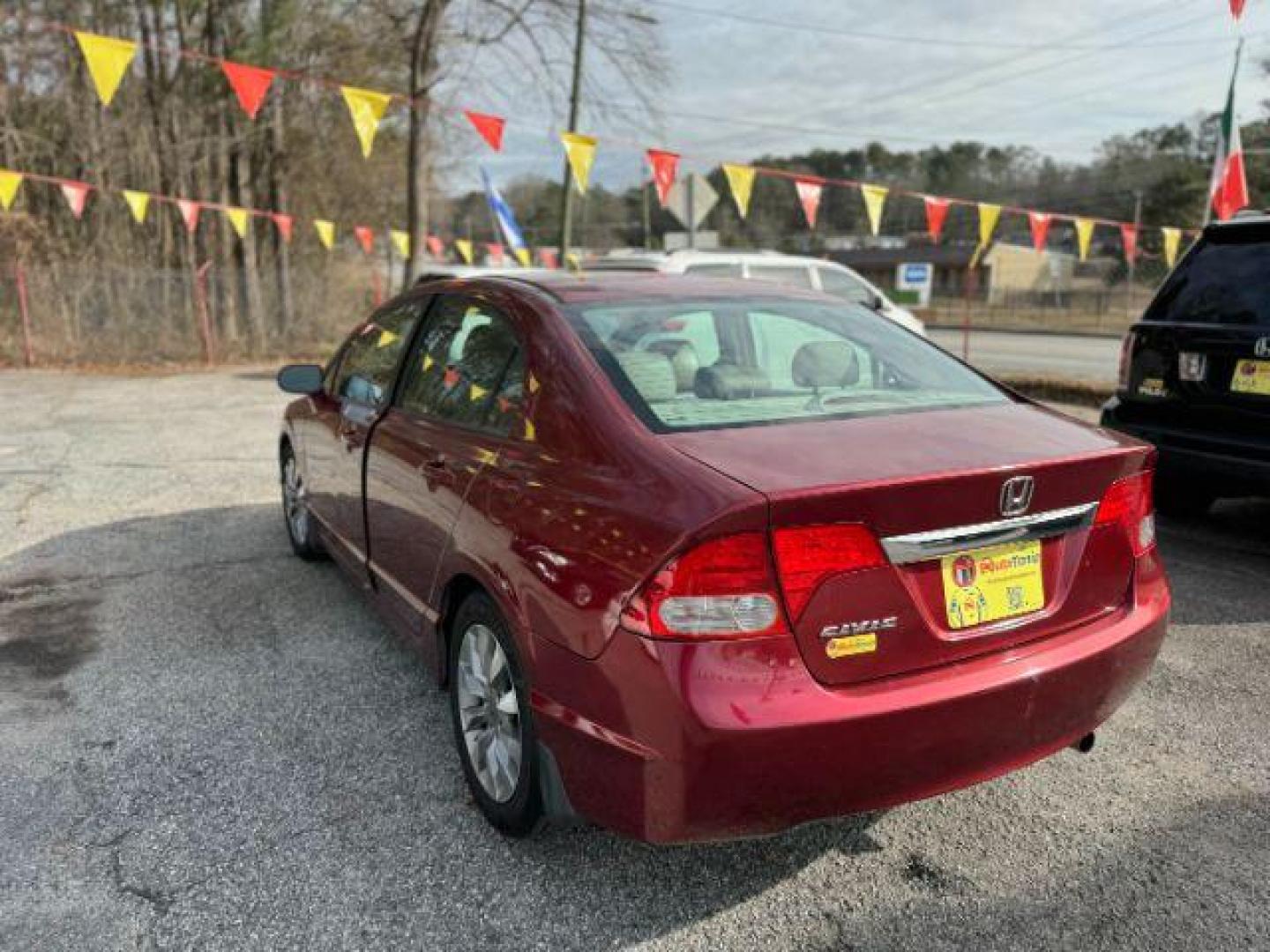 2010 Maroon Honda Civic EX-L Sedan 5-Speed A (19XFA1F92AE) with an 1.8L L4 SOHC 16V engine, 5-Speed Automatic transmission, located at 1806 Veterans Memorial Hwy SW, Austell, GA, 30168, (770) 944-9558, 33.817959, -84.606987 - Photo#5