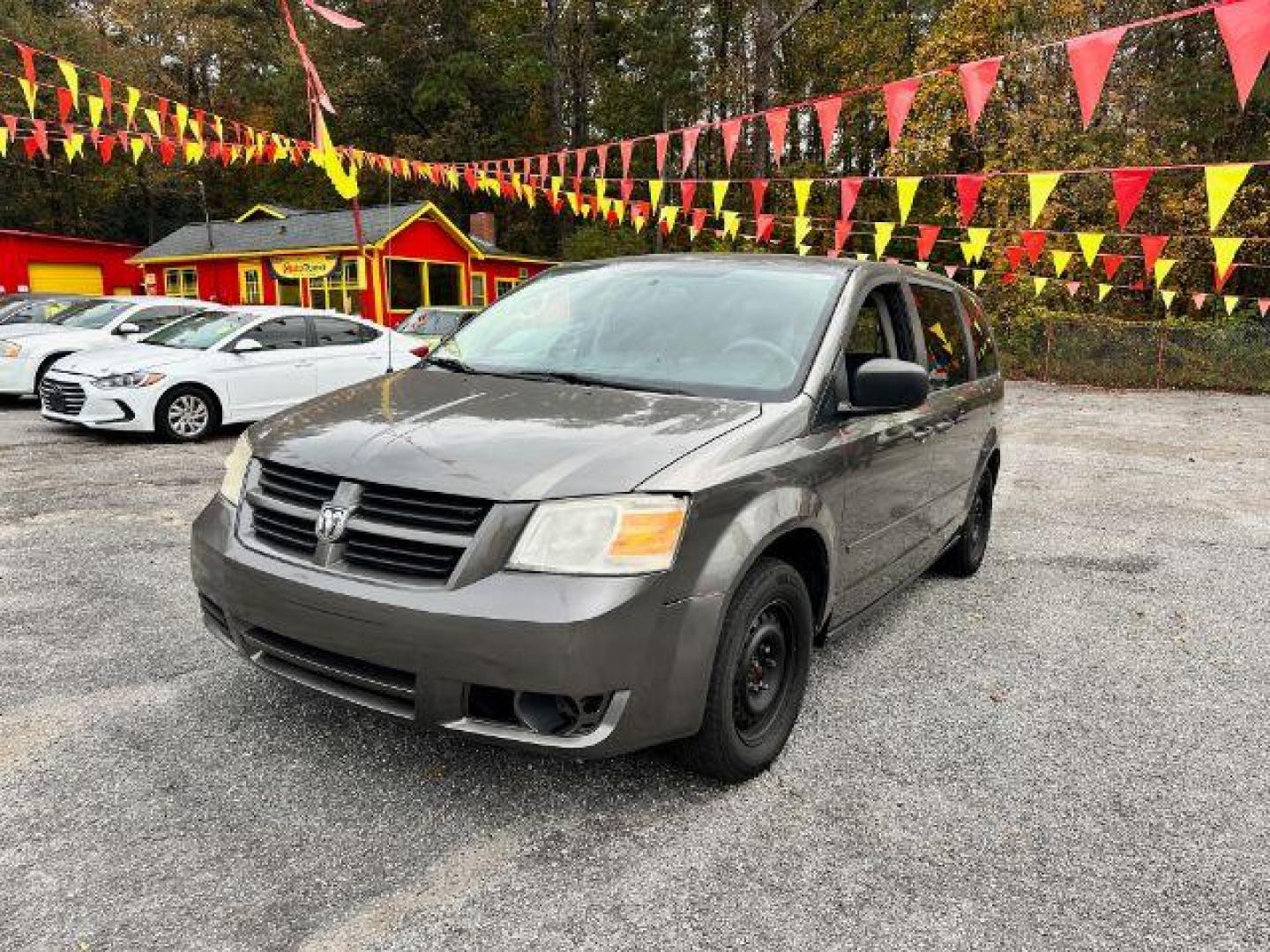 2010 Gray Dodge Grand Caravan SE (2D4RN4DE8AR) with an 3.3L V6 OHV 12V engine, 4-Speed Automatic transmission, located at 1806 Veterans Memorial Hwy SW, Austell, GA, 30168, (770) 944-9558, 33.817959, -84.606987 - Photo#0