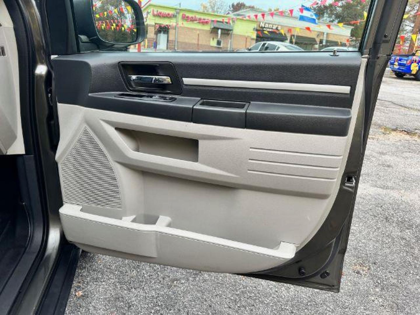 2010 Gray Dodge Grand Caravan SE (2D4RN4DE8AR) with an 3.3L V6 OHV 12V engine, 4-Speed Automatic transmission, located at 1806 Veterans Memorial Hwy SW, Austell, GA, 30168, (770) 944-9558, 33.817959, -84.606987 - Photo#14