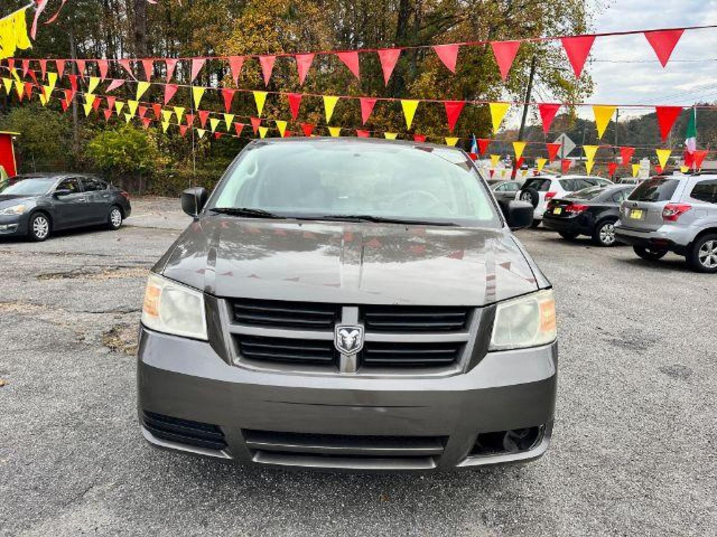 2010 Gray Dodge Grand Caravan SE (2D4RN4DE8AR) with an 3.3L V6 OHV 12V engine, 4-Speed Automatic transmission, located at 1806 Veterans Memorial Hwy SW, Austell, GA, 30168, (770) 944-9558, 33.817959, -84.606987 - Photo#1