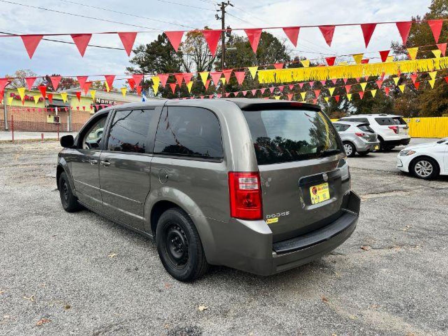 2010 Gray Dodge Grand Caravan SE (2D4RN4DE8AR) with an 3.3L V6 OHV 12V engine, 4-Speed Automatic transmission, located at 1806 Veterans Memorial Hwy SW, Austell, GA, 30168, (770) 944-9558, 33.817959, -84.606987 - Photo#5