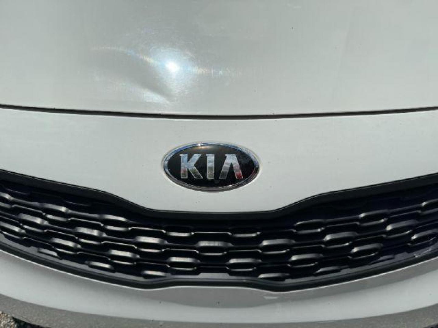 2015 White Kia Rio LX (KNADM4A37F6) with an 1.6L L4 DOHC 16V engine, 4-Speed Automatic transmission, located at 1806 Veterans Memorial Hwy SW, Austell, GA, 30168, (770) 944-9558, 33.817959, -84.606987 - Photo#16