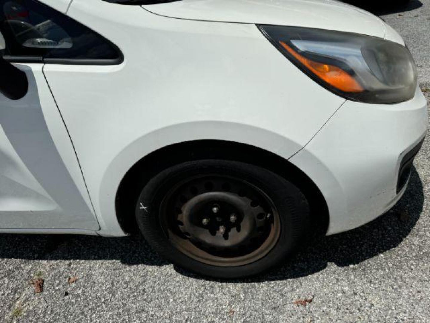 2015 White Kia Rio LX (KNADM4A37F6) with an 1.6L L4 DOHC 16V engine, 4-Speed Automatic transmission, located at 1806 Veterans Memorial Hwy SW, Austell, GA, 30168, (770) 944-9558, 33.817959, -84.606987 - Photo#18