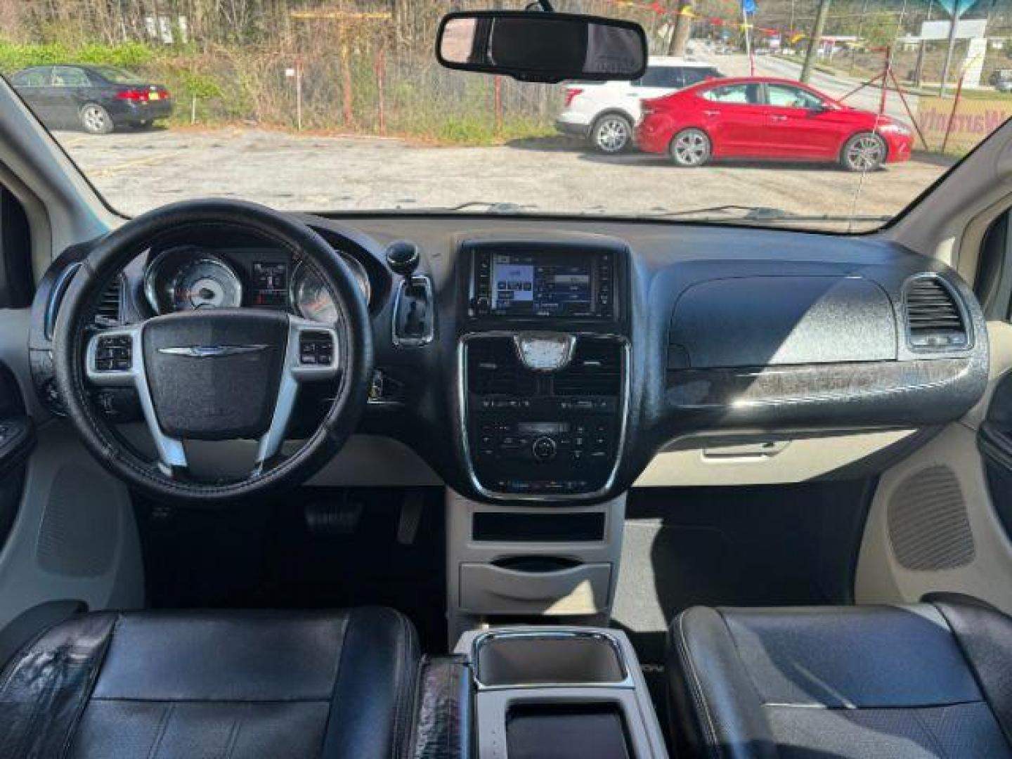 2012 Black Chrysler Town and Country Touring (2C4RC1BG3CR) with an 3.6L V6 DOHC 24V engine, 6-Speed Automatic transmission, located at 1806 Veterans Memorial Hwy SW, Austell, GA, 30168, (770) 944-9558, 33.817959, -84.606987 - Photo#9